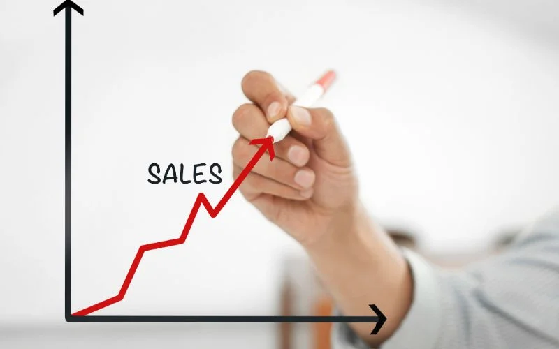 businessman-hand-drawing-sales-graph-concept-stock-photo