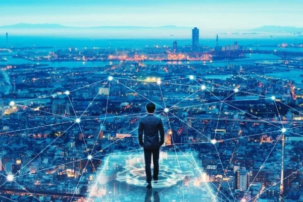 A-person-standing-on-the-edge-of-the-city-with-network-connections A-person-standing-on-the-edge-of-the-city-with-network-connections
