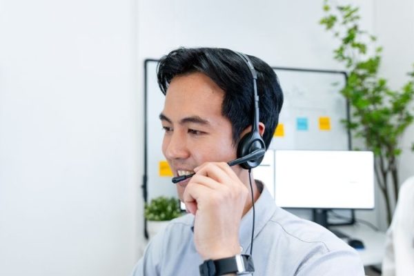 Smiling Agents Wearing Headsets